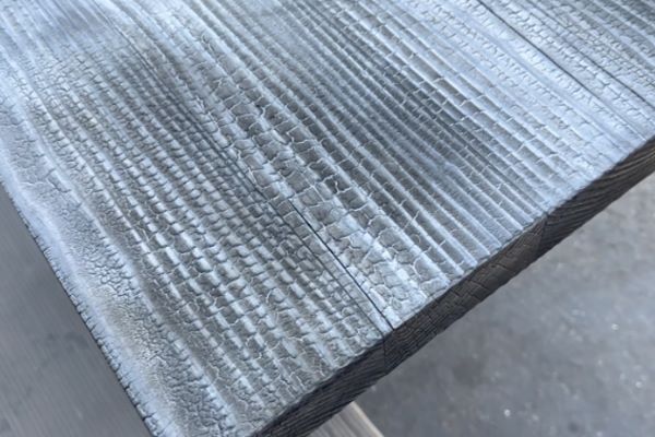 Burned table top surface