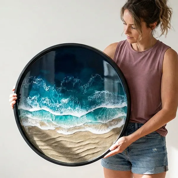 Resin artist creating ocean art